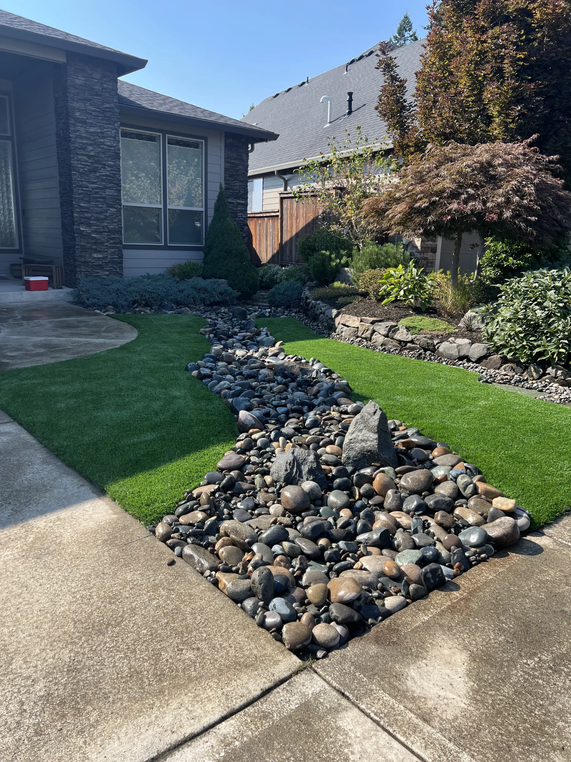 Modern Turf and River Rock Design Vancouver